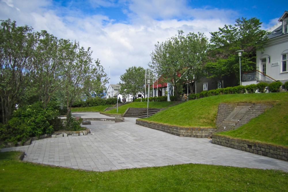 Bakarabrekkan green slope and paved square beside Lækjargata in central Reykjavík.