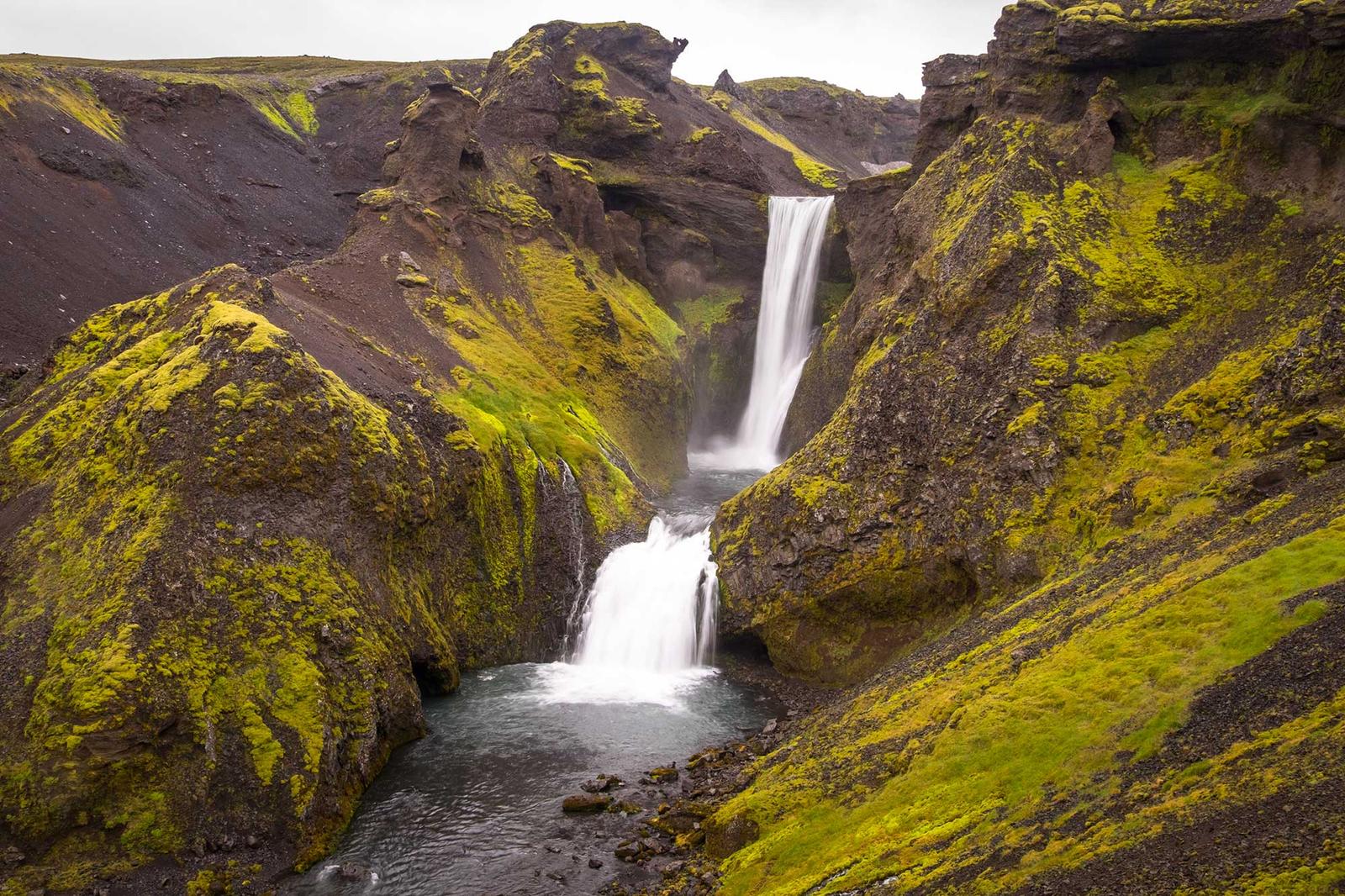 A narrow Skógá waterfall on the lower approach toward Fimmvörðuháls above Skógafoss.