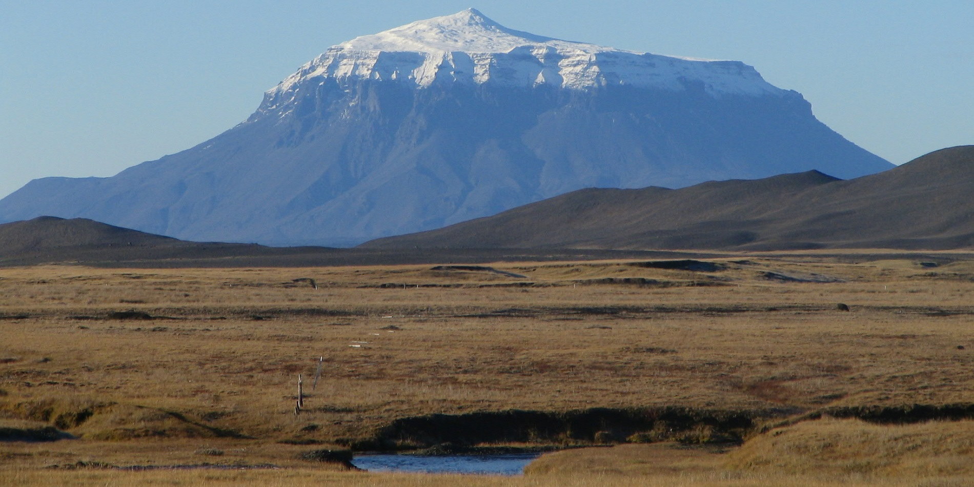 Herðubreið rising beyond the open highland landscape near Möðrudalur Farm.