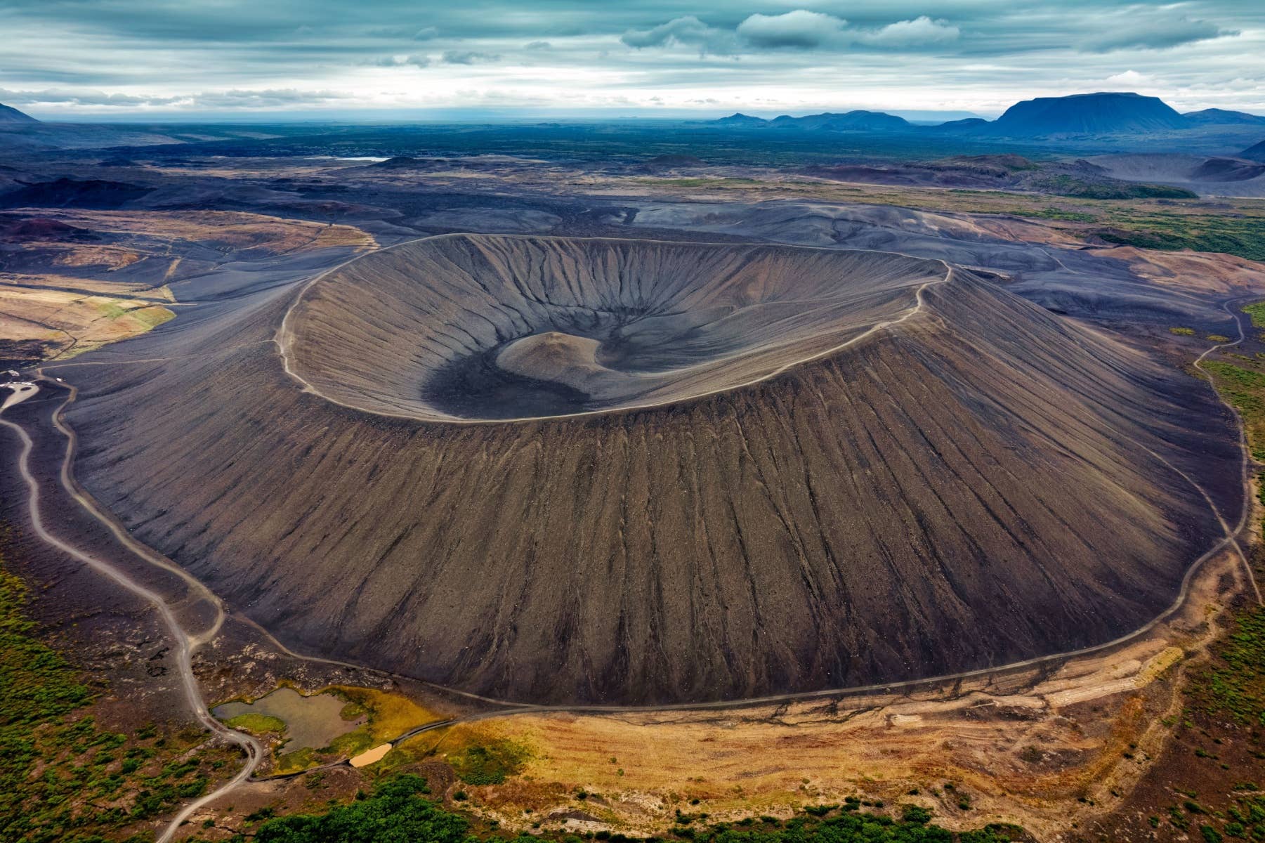 Hverfjall crater and Lake Mývatn landscape near the wider Hvannfell and Lofthellir route area.