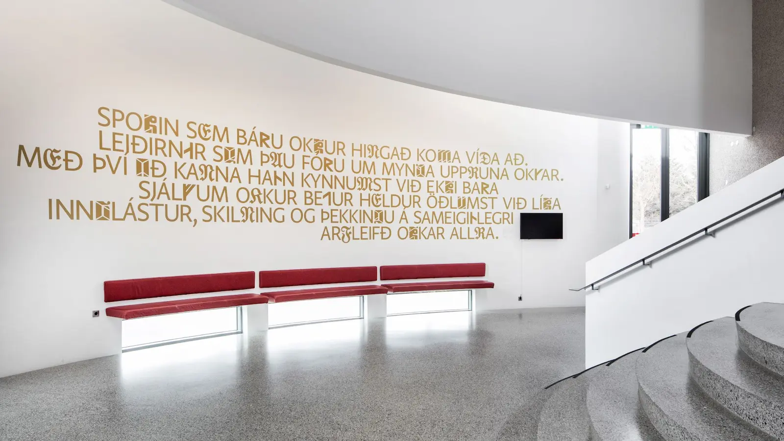 Bright lobby and stair area inside the National Museum of Iceland in Reykjavík.