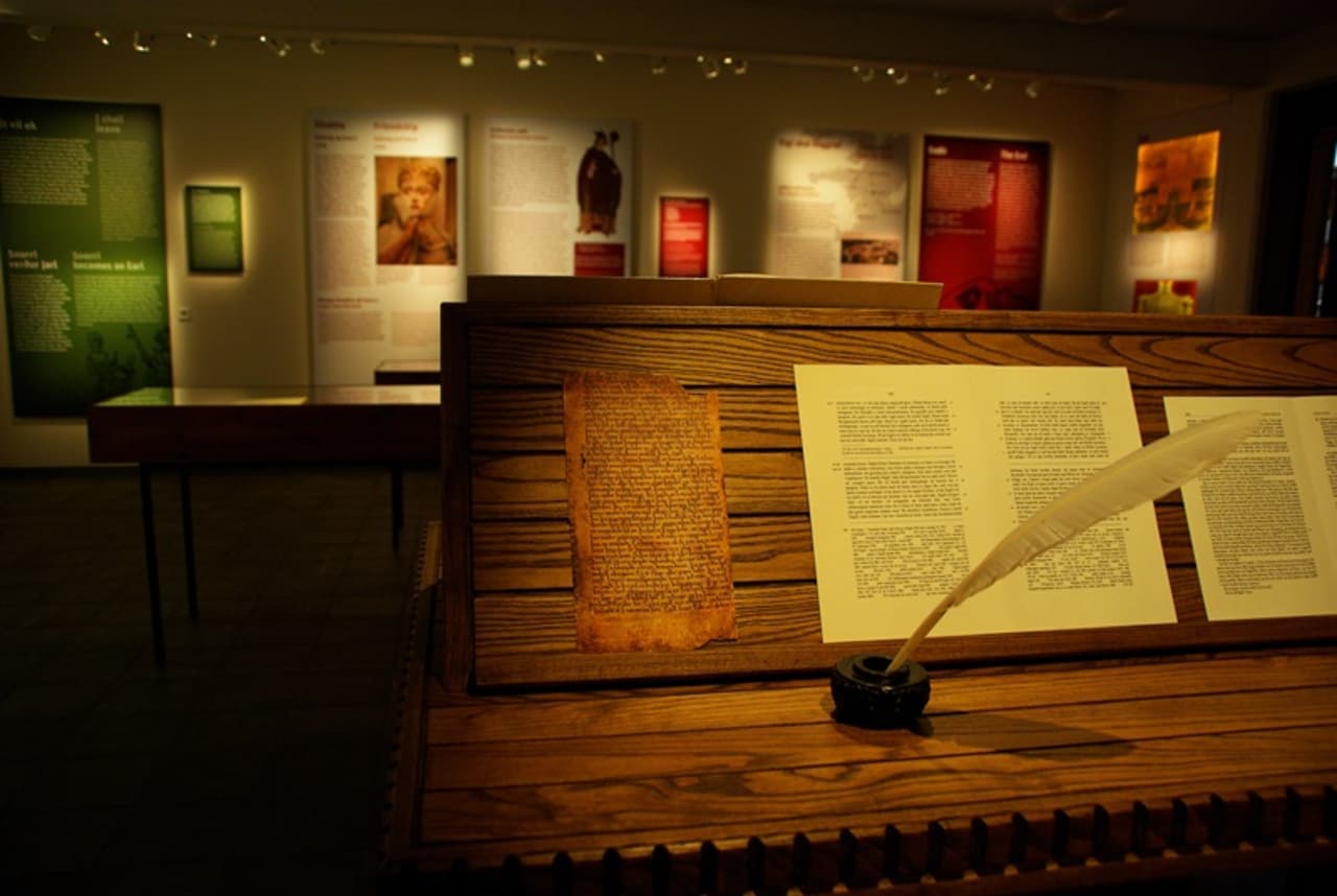 Snorrastofa exhibition room with manuscript displays and a writing quill