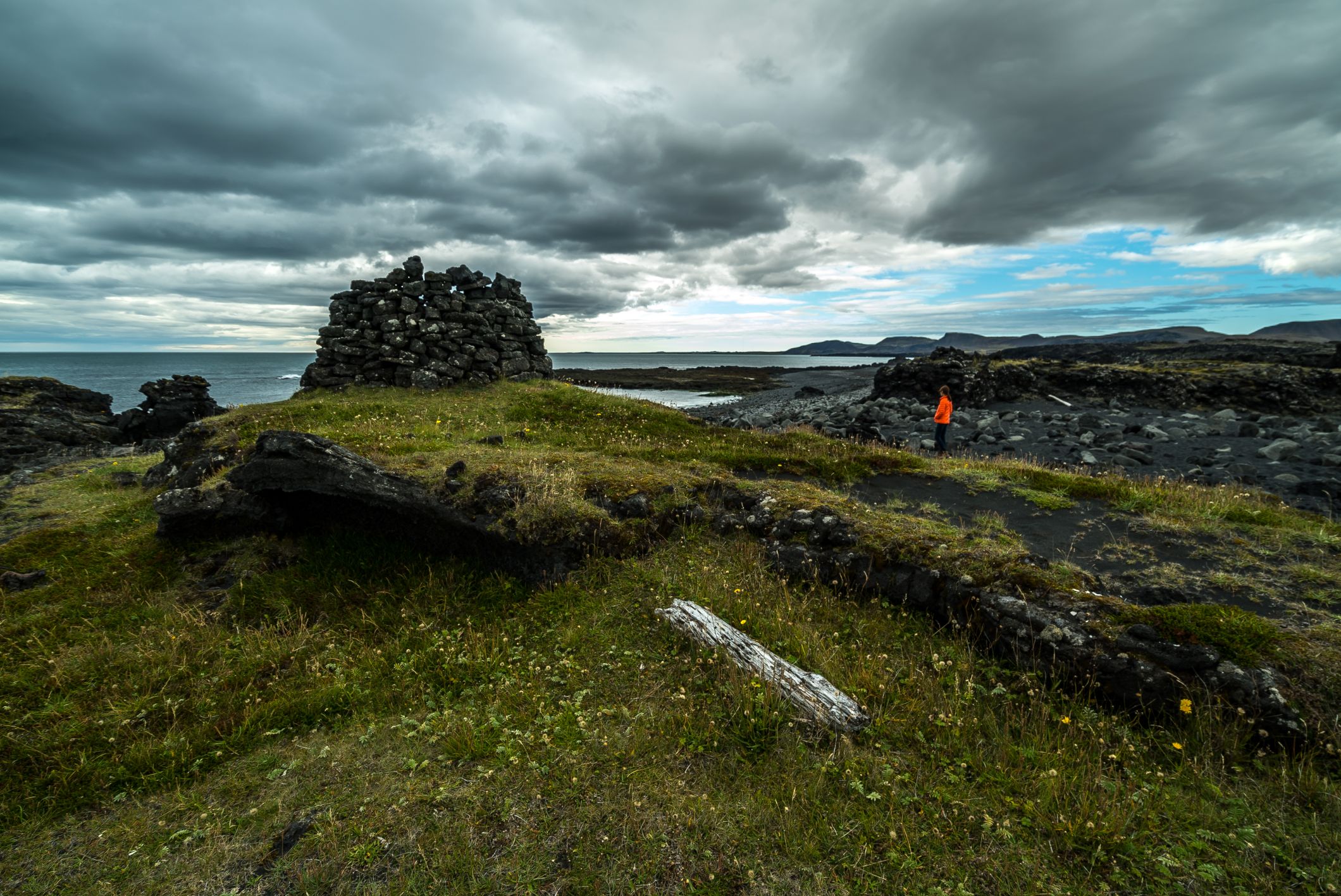 Old lava-stone ruins at Selatangar above the rough Reykjanes coast.