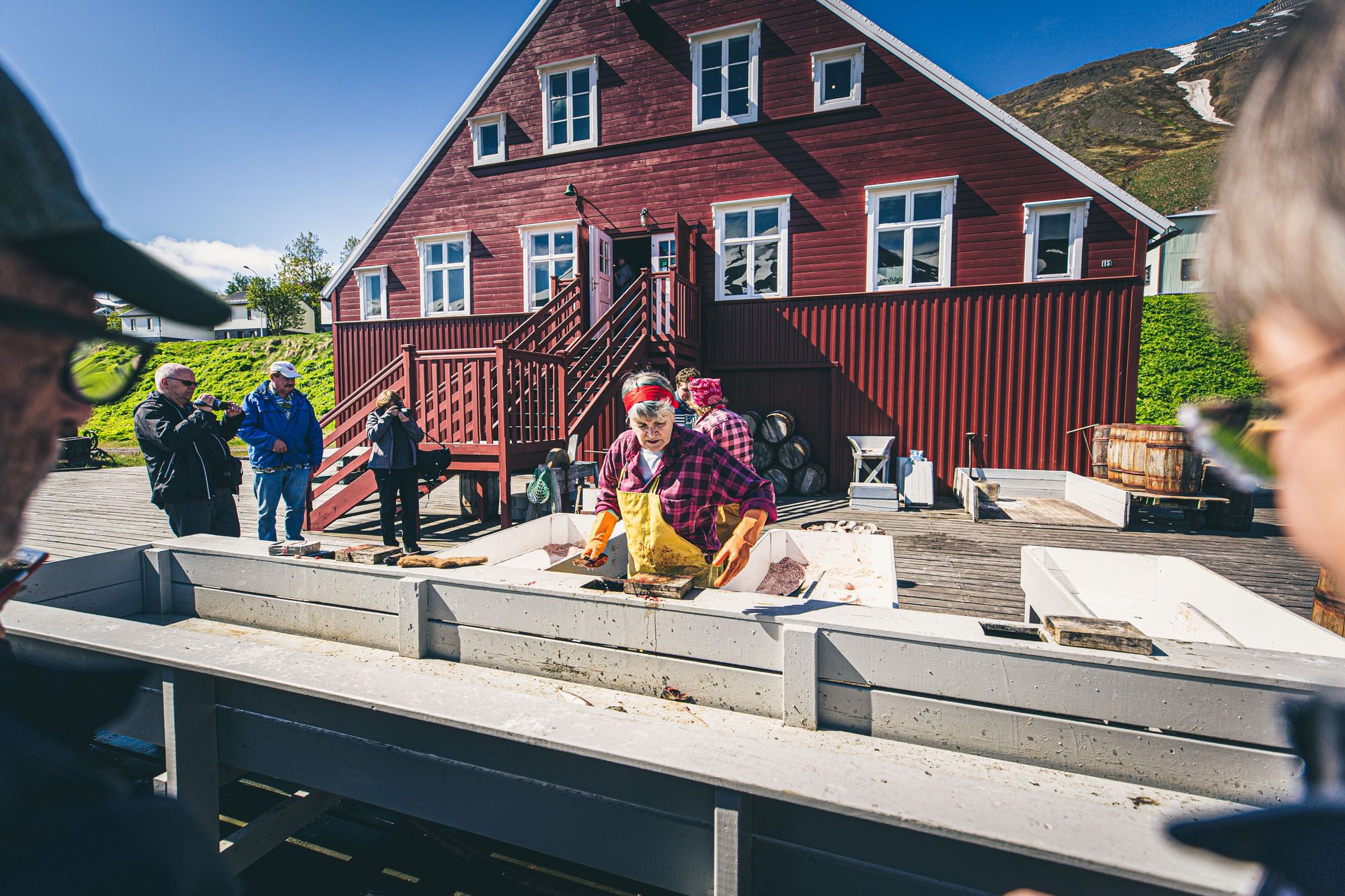 Colorful herring-era museum buildings beside the water in Siglufjörður.