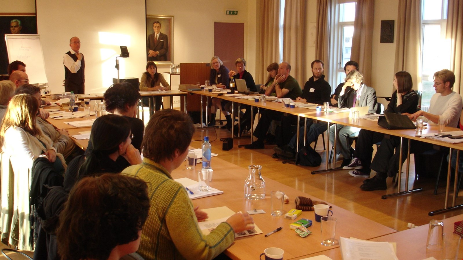 A seminar group inside Snorrastofa during a medieval studies session.