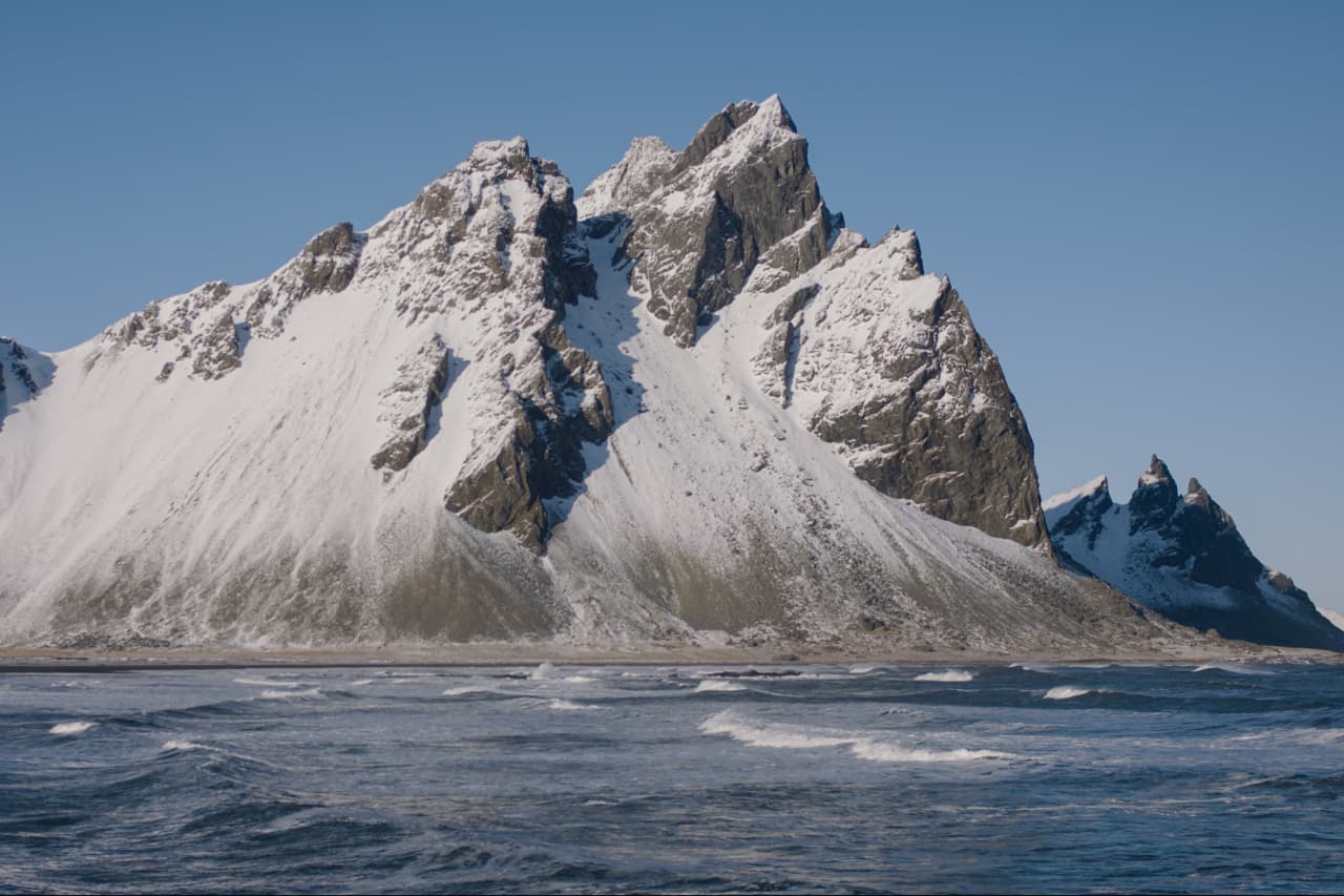 Close view of Vestrahorn above the exposed shoreline at Stokksnes.