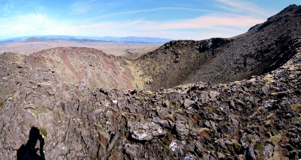 Rocky crater rim and dark volcanic slope inside Stóri-Bolli.