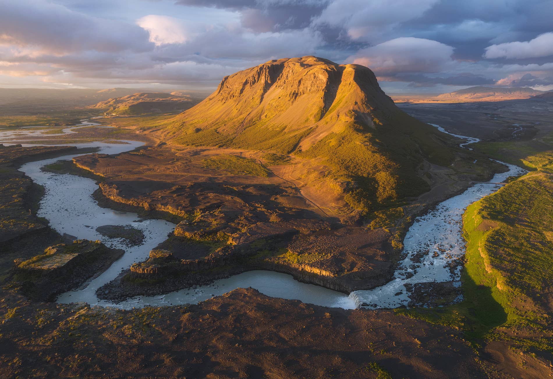 Þjófafoss waterfall on Þjórsá with Búrfell mountain rising behind it in South Iceland.
