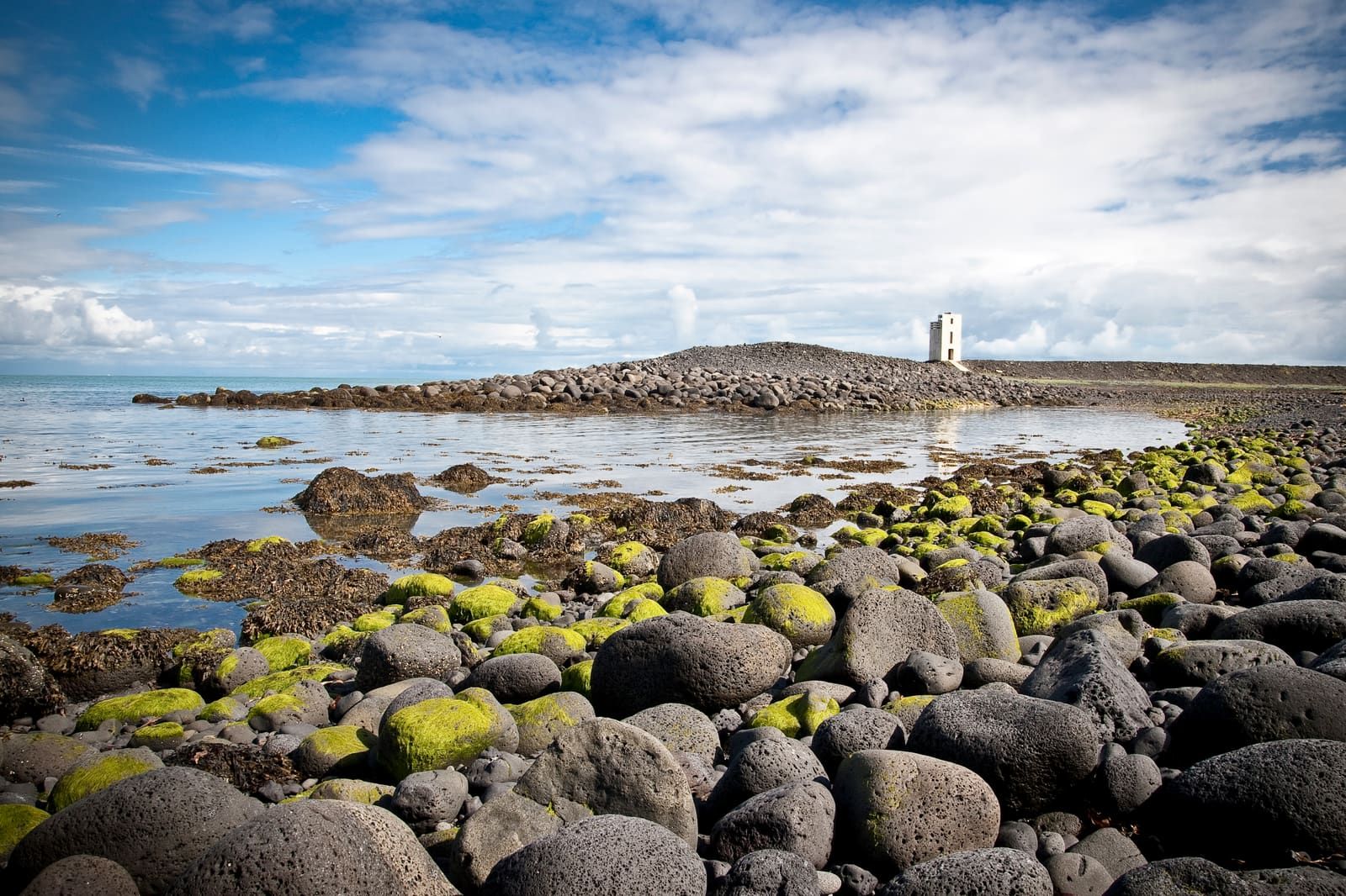 Hafnarnesviti lighthouse on the rocky coast south of Þorlákshöfn.