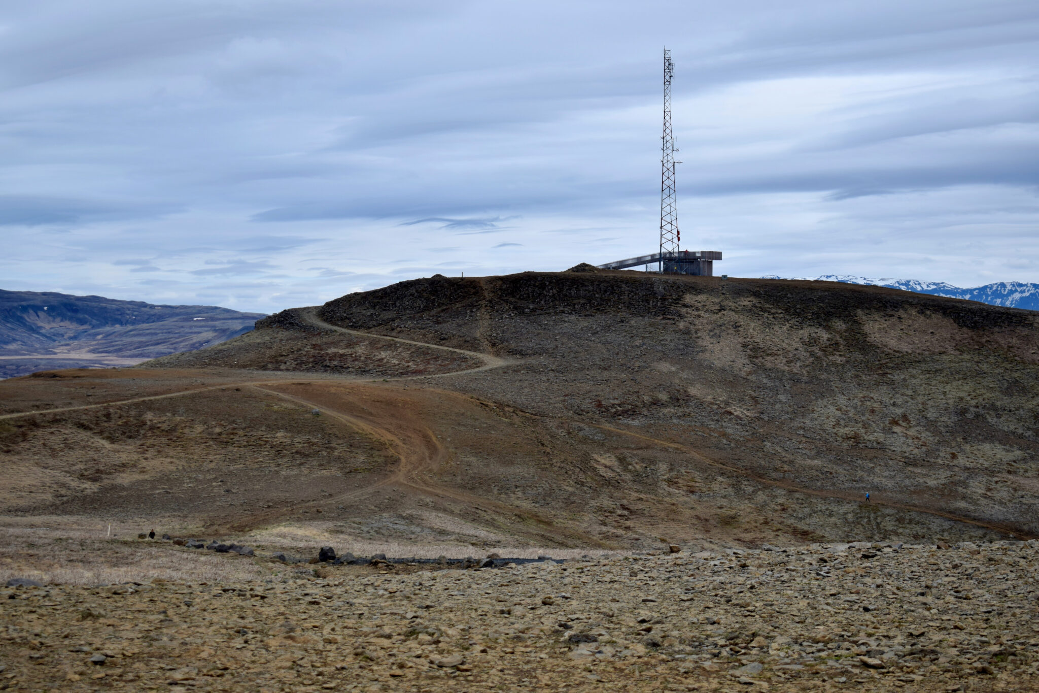 View from Úlfarsfell toward the snow-streaked slopes of Mount Esja.