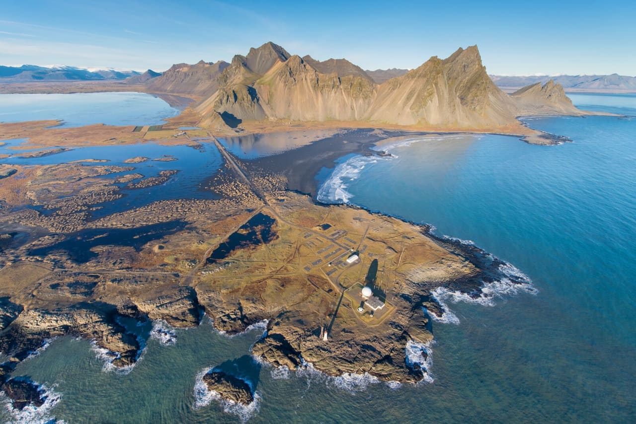 Aerial view of Vestrahorn, Stokksnes, and the exposed southeast shoreline.